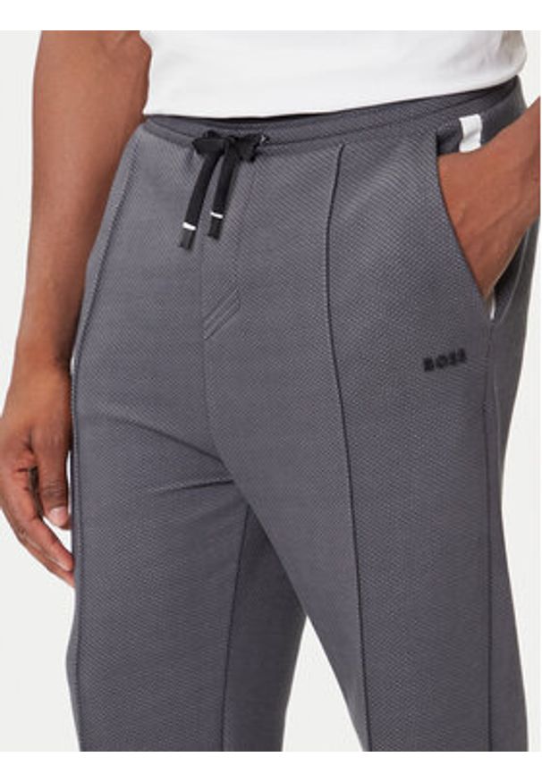 BOSS Spodnie dresowe TL 50543145 Szary Relaxed Fit. Kolor: szary. Materiał: syntetyk, bawełna