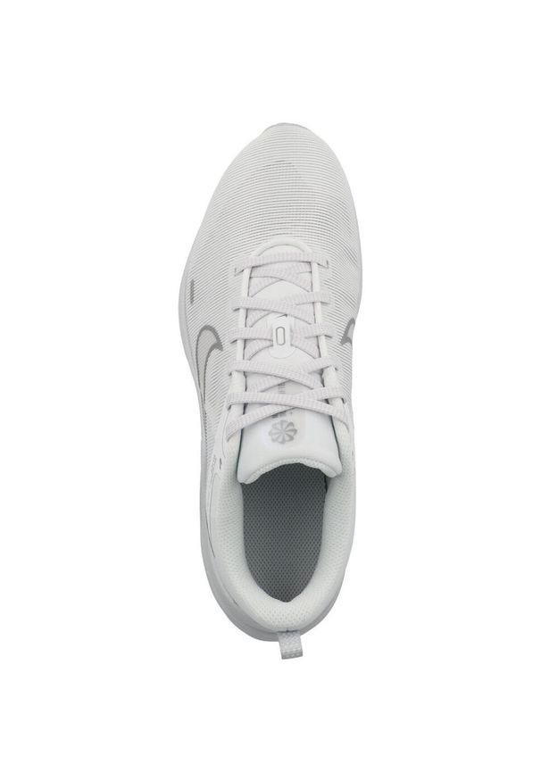Buty do biegania damskie Nike DD9294100. Zapięcie: sznurówki. Kolor: biały, wielokolorowy. Materiał: tkanina, materiał, syntetyk. Szerokość cholewki: normalna. Sport: turystyka piesza