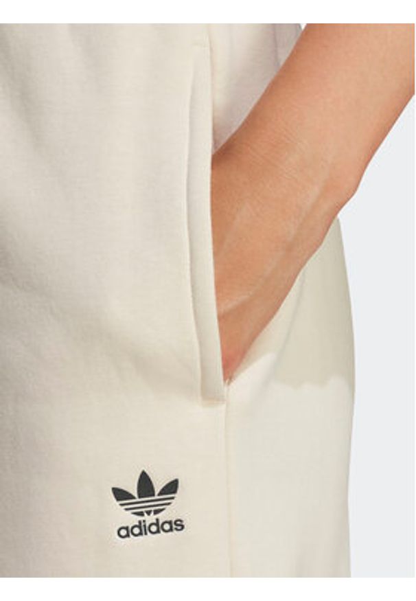 Adidas - adidas Spodnie dresowe Essentials Fleece IA6436 Écru Regular Fit. Materiał: syntetyk, bawełna