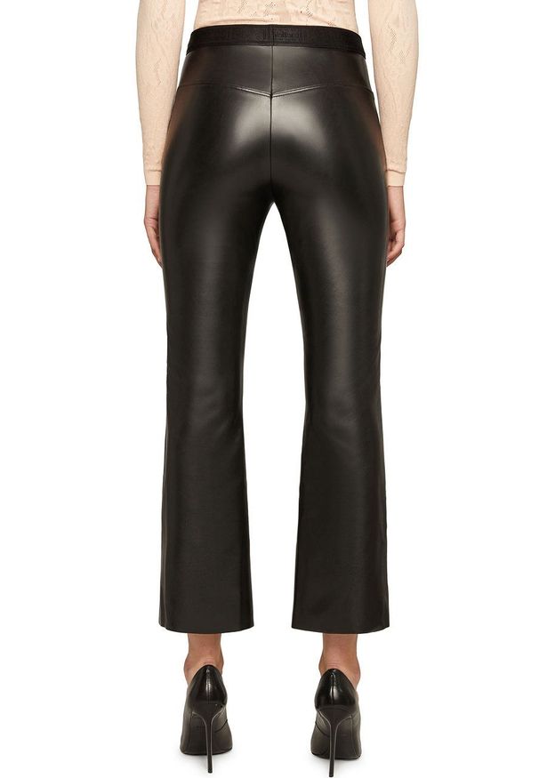 Wolford Spodnie Jenna damskie kolor czarny szerokie high waist. Stan: podwyższony. Kolor: czarny