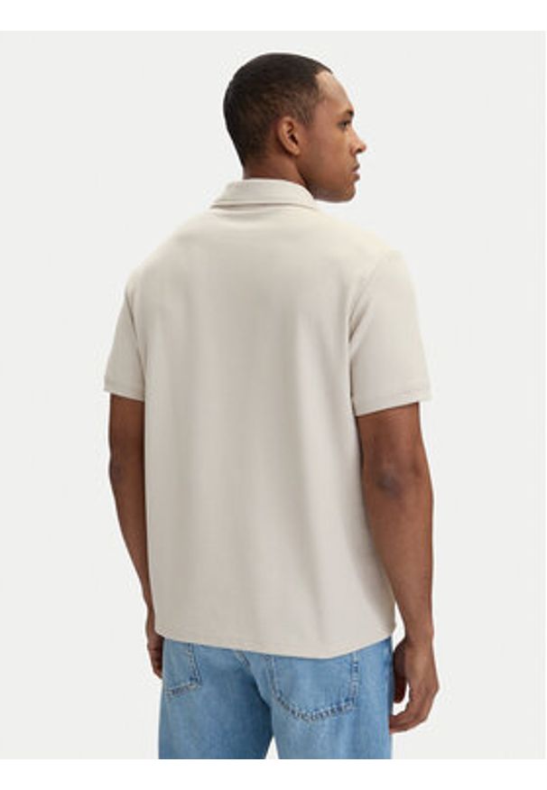 Calvin Klein Jeans Polo LV04RF205G Kremowy Regular Fit. Typ kołnierza: polo. Kolor: kremowy. Materiał: bawełna
