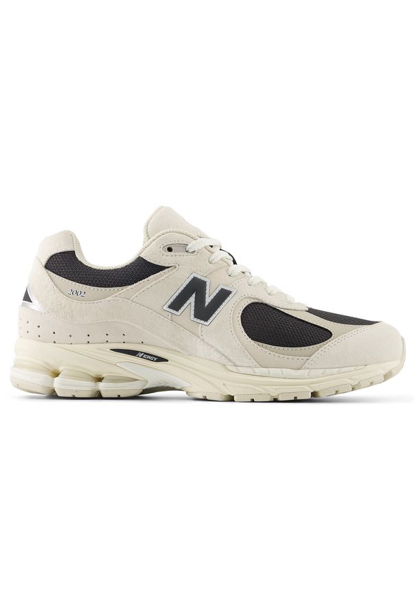 Buty unisex New Balance U2002RN – beżowe. Kolor: beżowy. Materiał: zamsz, guma. Szerokość cholewki: normalna