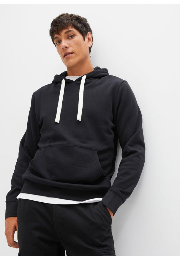 bonprix - Bawełniana bluza z kapturem. Typ kołnierza: kaptur. Kolor: czarny. Materiał: bawełna. Wzór: prążki