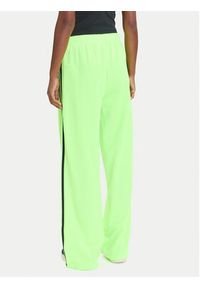 Adidas - adidas Spodnie dresowe adicolor Classic Firebird JW1228 Zielony Loose Fit. Kolor: zielony. Materiał: syntetyk