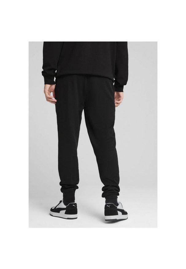 Puma - Męskie spodnie Essentials Elevated PUMA Black. Kolor: czarny