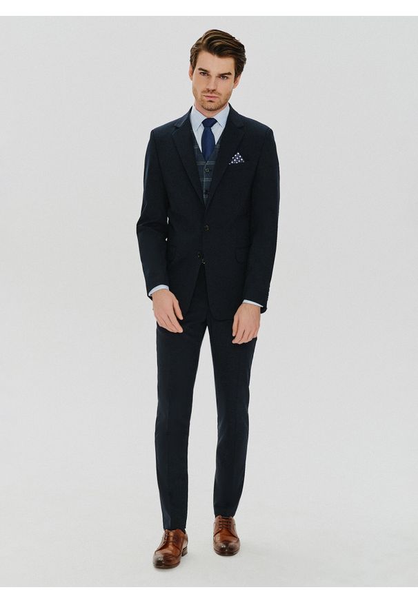 Pako Lorente - PAKO LORENTE – Gładkie granatowe spodnie garniturowe. Kolor: niebieski. Materiał: wełna, poliester, elastan. Wzór: gładki