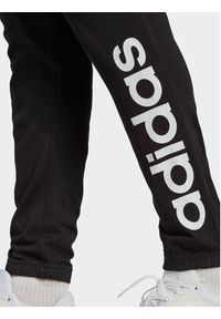 Adidas - adidas Spodnie dresowe Essentials Single Jersey Tapered Elasticized Cuff Logo Joggers IC0055 Czarny Regular Fit. Kolor: czarny. Materiał: bawełna #6