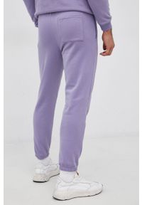 GAP Spodnie męskie kolor fioletowy gładkie. Kolor: fioletowy. Materiał: dzianina, poliester. Wzór: gładki