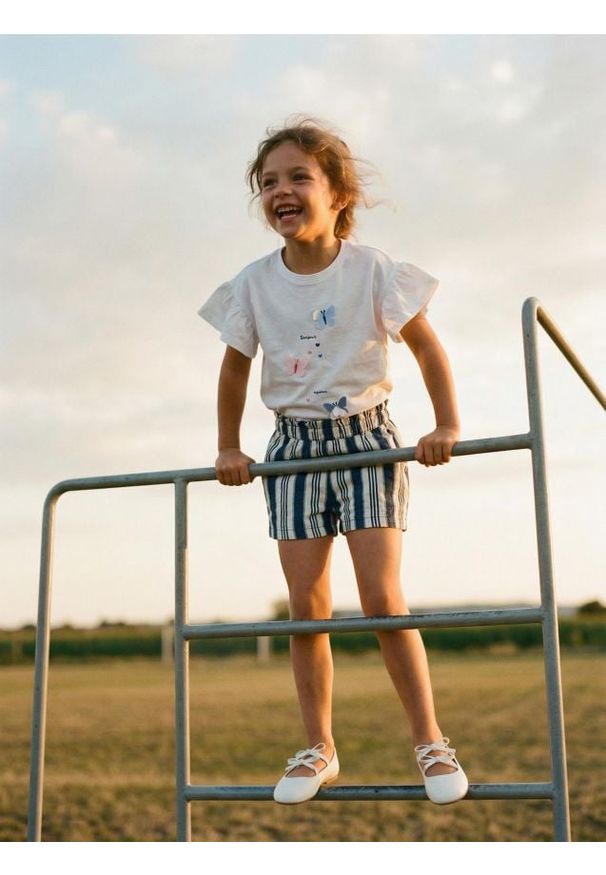 Sinsay - Bawełniane szorty w paski - wielobarwny. Materiał: bawełna. Wzór: paski