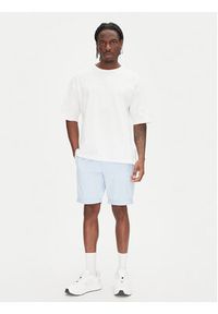 Tommy Jeans Szorty materiałowe Scanton DM0DM21950 Błękitny Slim Fit. Kolor: niebieski. Materiał: bawełna
