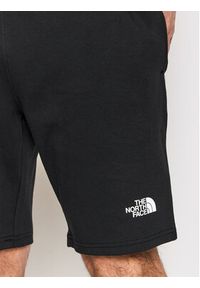 The North Face Szorty sportowe Graphic NF0A3S4F Czarny Regular Fit. Kolor: czarny. Materiał: bawełna. Styl: sportowy