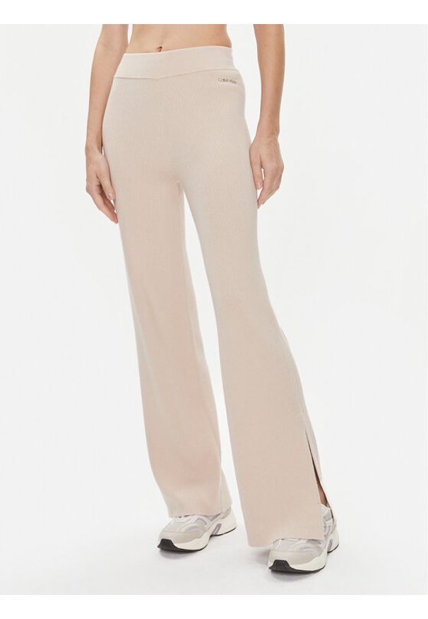 Calvin Klein Spodnie dzianinowe Essential K20K206023 Beżowy Wide Leg. Kolor: beżowy. Materiał: syntetyk