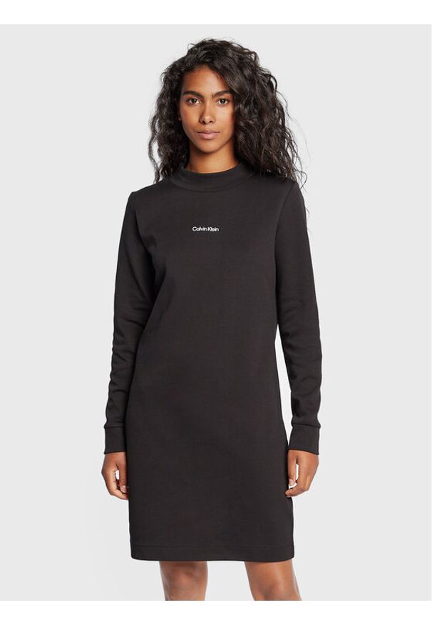Calvin Klein Sukienka dzianinowa Micro Logo K20K204611 Czarny Regular Fit. Kolor: czarny. Materiał: bawełna, dzianina