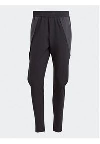 Adidas - adidas Spodnie dresowe City Escape Cargo IJ6098 Czarny Slim Fit. Kolor: czarny. Materiał: dresówka, syntetyk #6