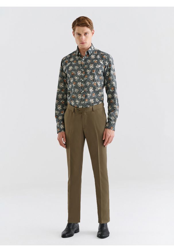 Pako Lorente - PAKO LORENTE – Zielone spodnie garniturowe z wełną. Kolor: zielony. Materiał: wełna