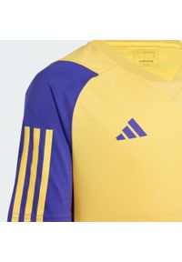 Adidas - Koszulka Real Madrid Tiro 23 Training Kids. Kolor: żółty. Materiał: materiał. Sport: piłka nożna