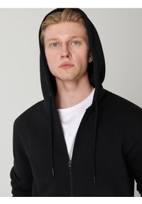 Sinsay - Bluza z kapturem - czarny. Typ kołnierza: kaptur. Kolor: czarny. Materiał: bawełna #1