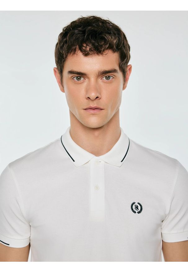 Big-Star - Koszulka męska polo biała Polian 100. Typ kołnierza: polo. Kolor: biały. Materiał: dzianina. Wzór: haft, paski, ze splotem. Styl: klasyczny