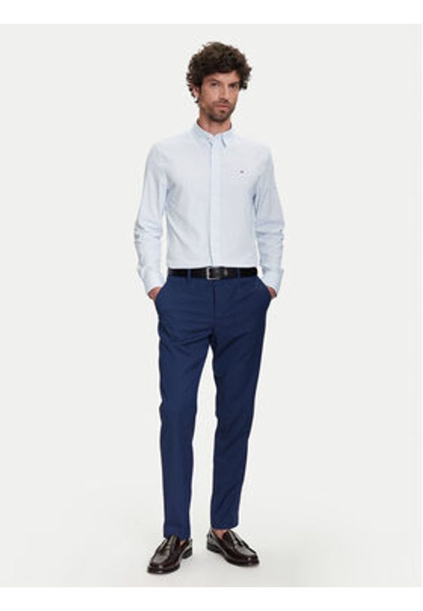 TOMMY HILFIGER - Tommy Hilfiger Koszula Performance MW0MW39419 Błękitny Regular Fit. Kolor: niebieski. Materiał: syntetyk