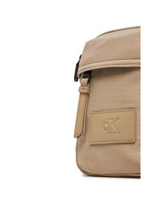 Calvin Klein Jeans Saszetka Metro Nylon Reporter S Ny LV04G3089G Beżowy. Kolor: beżowy. Materiał: materiał #2