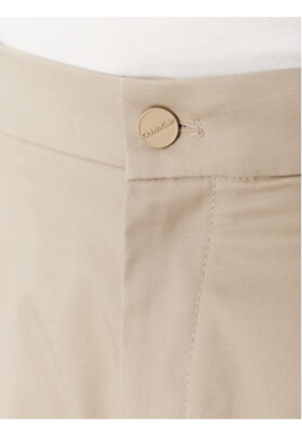 Calvin Klein Chinosy K10K114104 Beżowy Tapered Fit. Kolor: beżowy. Materiał: bawełna