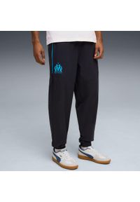Puma - Spodnie dresowe OM Woven 2025/26. Kolor: niebieski. Materiał: dresówka. Sport: piłka nożna