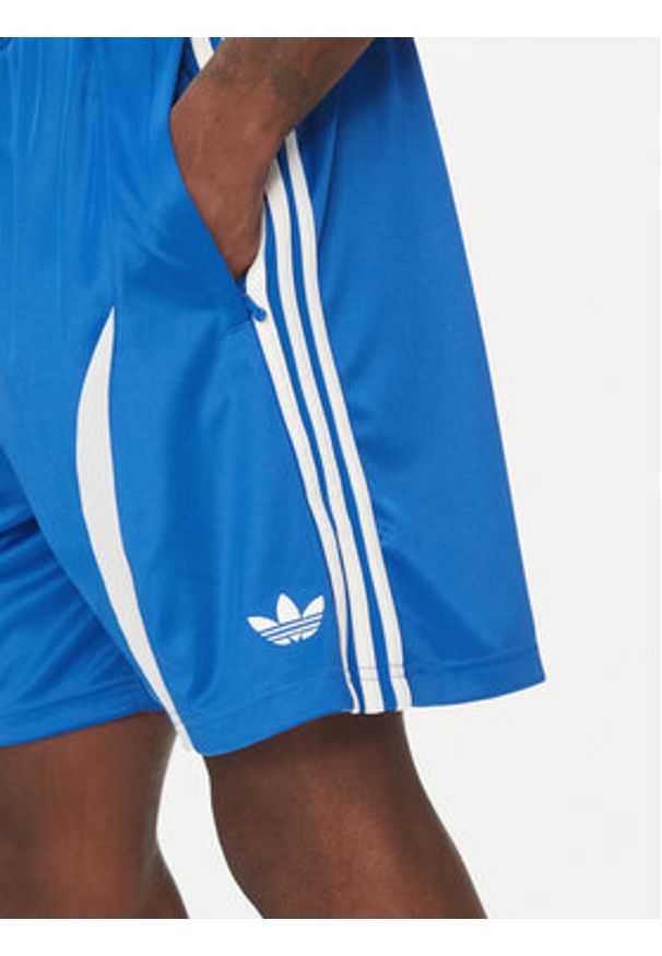 Adidas - adidas Szorty sportowe adicolor Teamgeist JP1123 Niebieski Regular Fit. Kolor: niebieski. Materiał: syntetyk. Styl: sportowy