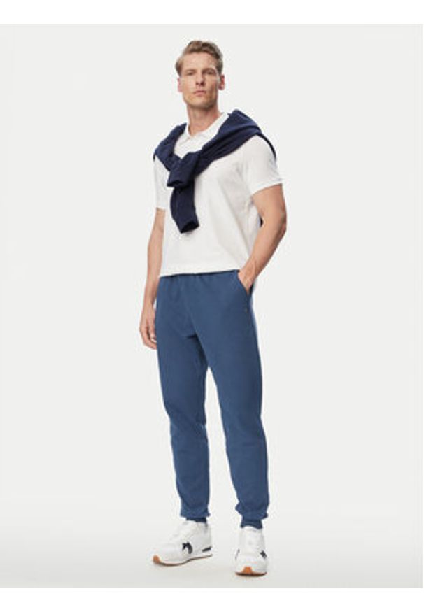 TOMMY HILFIGER - Tommy Hilfiger Spodnie dresowe Essential MW0MW37236 Niebieski Regular Fit. Kolor: niebieski. Materiał: bawełna