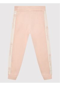 Champion Spodnie dresowe 404471 Różowy Regular Fit. Kolor: różowy. Materiał: bawełna