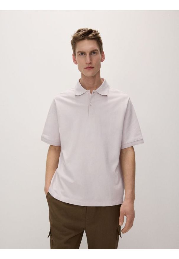 Reserved - Koszulka polo oversize - różowy. Typ kołnierza: polo. Kolor: różowy. Materiał: bawełna, dzianina