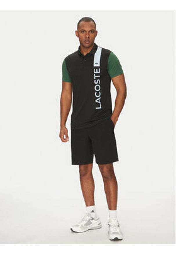 Lacoste Polo DH8940 Czarny Regular Fit. Typ kołnierza: polo. Kolor: czarny. Materiał: syntetyk