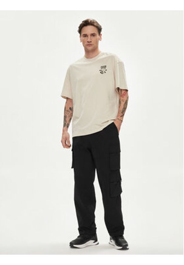 Jack & Jones - Jack&Jones Spodnie materiałowe Karl 12253626 Czarny Loose Fit. Kolor: czarny. Materiał: syntetyk