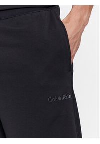 Calvin Klein Performance Szorty sportowe 00GMS4S841 Czarny Regular Fit. Kolor: czarny. Materiał: syntetyk. Styl: sportowy #3