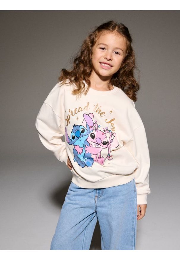 Sinsay - Bawełniana bluza z nadrukiem Stitch - kremowy. Kolor: kremowy. Materiał: bawełna. Wzór: nadruk