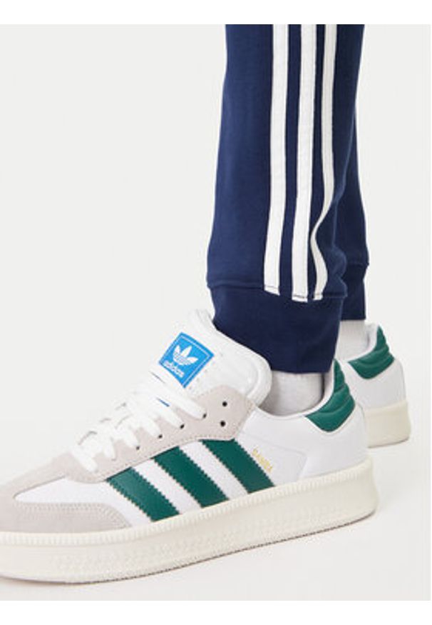 Adidas - adidas Spodnie dresowe 3-Stripes KE3561 Granatowy Slim Fit. Kolor: niebieski. Materiał: syntetyk