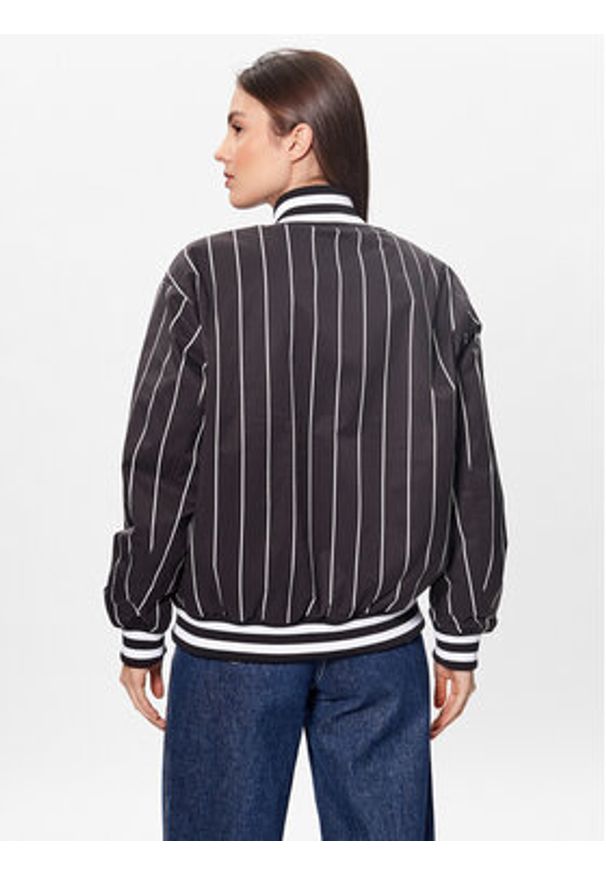 Tommy Jeans Kurtka bomber Pinstripe Letterman DW0DW15336 Czarny Relaxed Fit. Kolor: czarny. Materiał: syntetyk