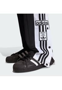 Adidas - adidas Spodnie dresowe Adibreak KD2932 Czarny Loose Fit. Kolor: czarny. Materiał: syntetyk #3