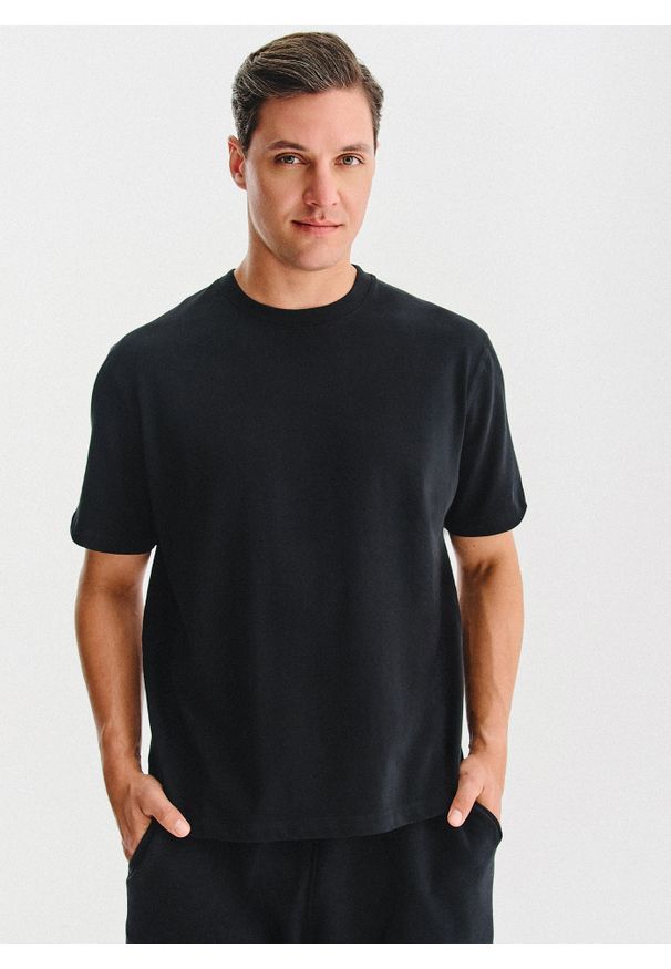 Pako Lorente - PAKO LORENTE - Czarny t-shirt oversize. Okazja: na co dzień. Kolor: brązowy, biały, czarny. Materiał: bawełna. Styl: casual