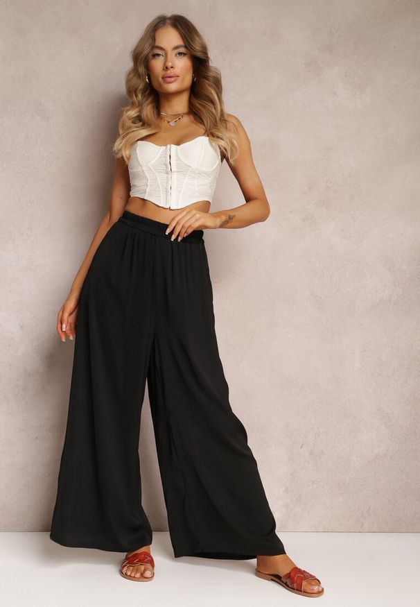 Renee - Czarne Spodnie z Szerokimi Nogawkami i Gumką w Pasie Jacobisa. Stan: podwyższony. Kolor: czarny