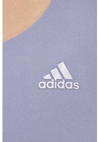 adidas Performance biustonosz do jogi kolor fioletowy gładki. Kolor: fioletowy. Materiał: skóra, materiał. Wzór: gładki. Sport: joga i pilates #2
