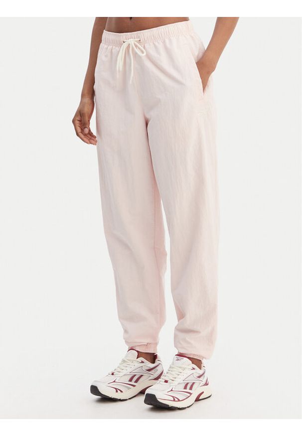 Reebok Spodnie dresowe Galina RK25518CCW Różowy Relaxed Fit. Kolor: różowy. Materiał: syntetyk