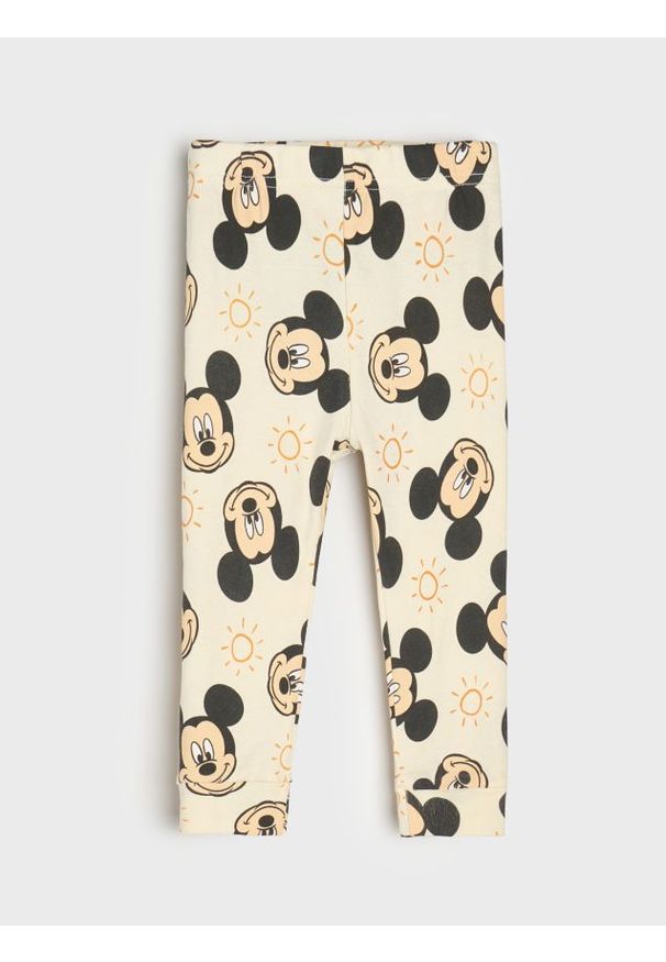 Sinsay - Bawełniane legginsy ze wzorem Mickey Mouse - kremowy. Kolor: kremowy. Materiał: bawełna. Wzór: motyw z bajki