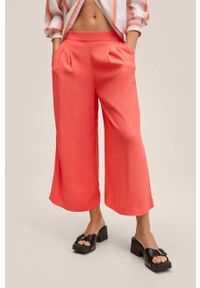 mango - Mango spodnie Life damskie kolor czerwony szerokie high waist. Stan: podwyższony. Kolor: czerwony