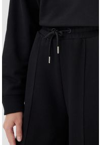 Guess - GUESS Czarne dresowe spodnie damskie Primula, Rozmiar XS. Kolor: czarny. Materiał: dresówka #3