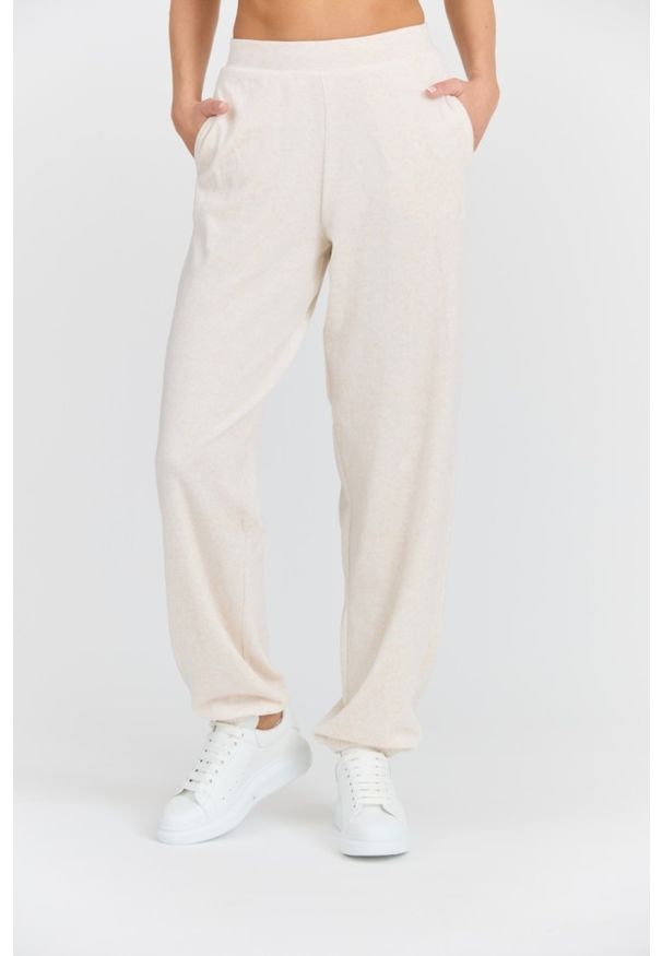 Juicy Couture - JUICY COUTURE Damskie beżowe spodnie dresowe Davidson Gold, Rozmiar XS. Kolor: beżowy. Materiał: dresówka. Długość: długie