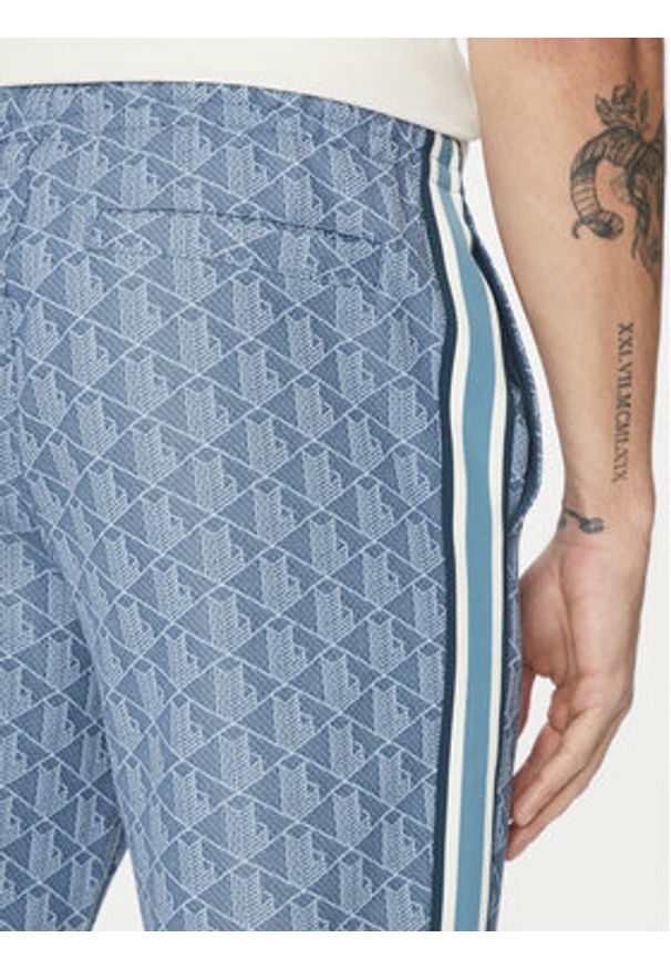 Lacoste Spodnie dresowe XH1440 Niebieski Regular Fit. Kolor: niebieski. Materiał: bawełna, syntetyk