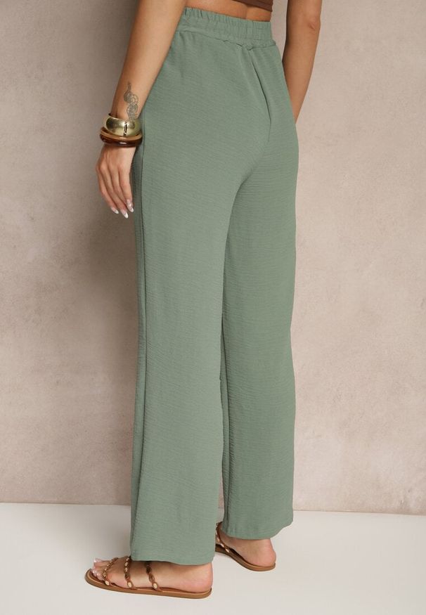 Renee - Ciemnozielone Spodnie z Szeroką Nogawką Wiązane w Talii Salemira. Okazja: na co dzień. Kolor: zielony. Styl: casual