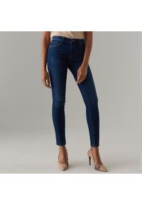 Mohito - Jeansy skinny z przetarciami -. Materiał: jeans #1