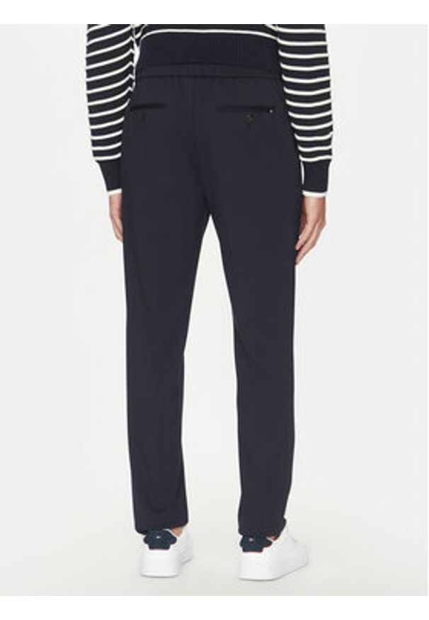 TOMMY HILFIGER - Tommy Hilfiger Spodnie materiałowe Punto MW0MW39197 Granatowy Regular Fit. Kolor: niebieski. Materiał: syntetyk