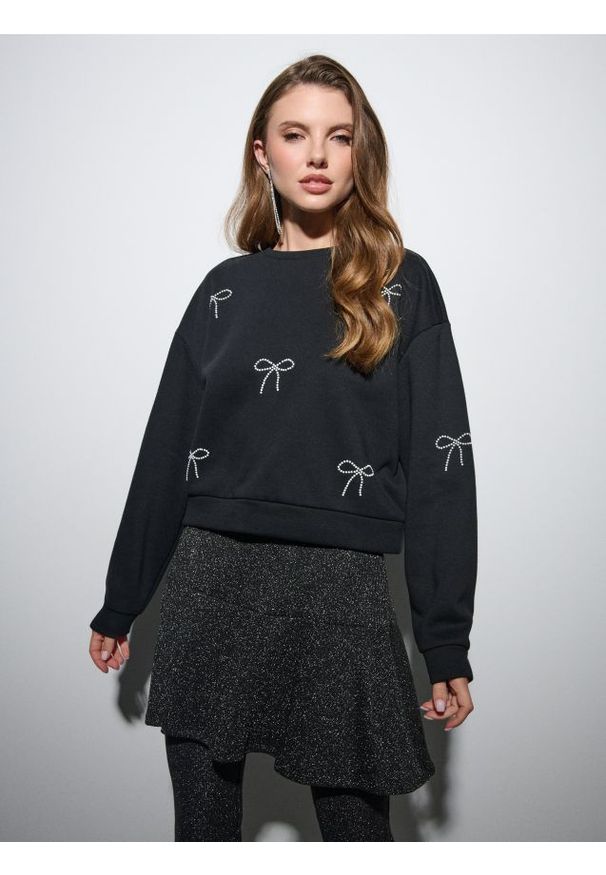 Sinsay - Prążkowana spódnica mini - czarny. Kolor: czarny. Materiał: prążkowany